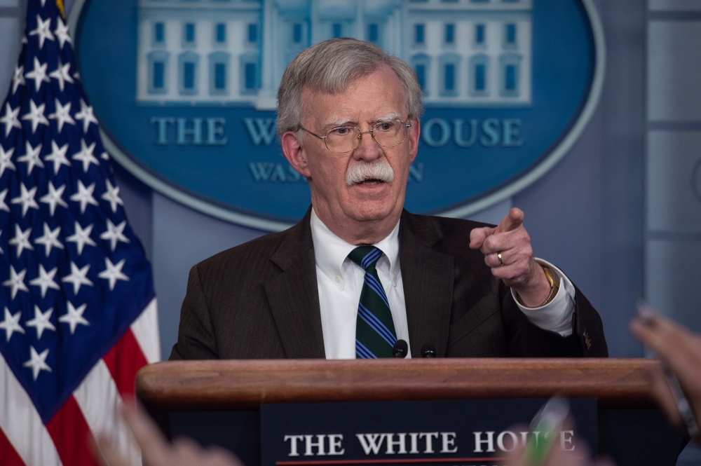 US National Security Advisor John Bolton speaks at a press briefing at the White House in Washington, DC, on November 27, 2018. / AFP / NICHOLAS KAMM 