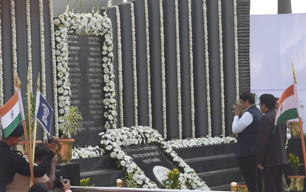 Maharashtra Chief minister Devendra Fadnavis pays respect at the Police Memorial, during an event to commemorate the 10th anniversary of the 2008 Mumbai militant attacks in Mumbai on November 26, 2018. AFP/Indranil Mukherjee 