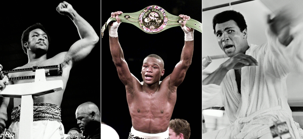 (L to R) US heavy weight boxing champion George Foreman (L) during the weigh-in before the heavy weight world championship in Kinshasa on October 29, 1974, WBC Super Featherweight Champion Floyd Mayweather (C) holding up his belt after beating Diego Corra