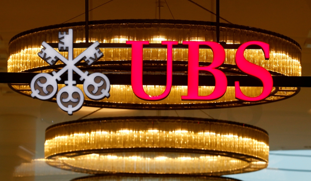 File photo f the logo of Swiss bank UBS is seen at a branch office in Basel, Switzerland March 29, 2017. REUTERS/Arnd Wiegmann/File Photo