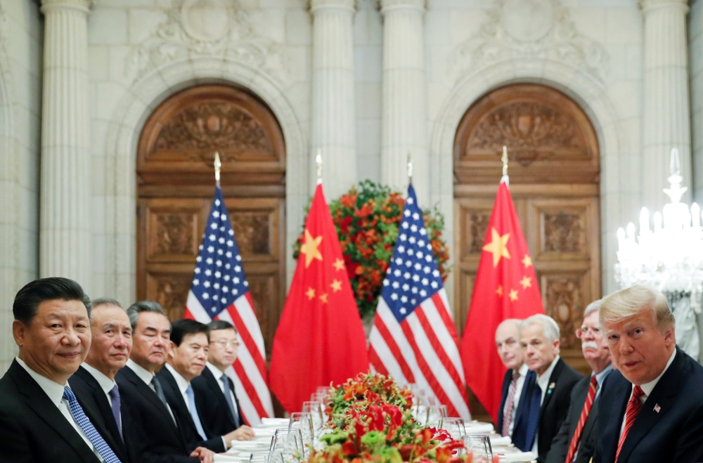 US President Donald Trump (R) and Chinese President Xi Jinping attend a working dinner after the G20 leaders summit in Buenos Aires, Argentina December 1, 2018. REUTERS/Kevin Lamarque