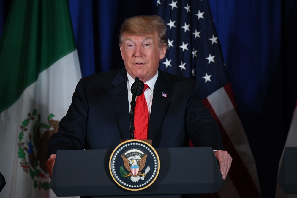 US President Donald Trump delivers a statement on the signing of a new free trade agreement in Buenos Aires, on November 30, 2018, on the sidelines of the G20 Leaders' Summit. AFP / Martin BERNETTI