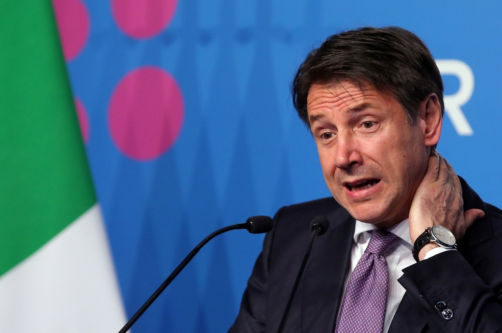 Italian Prime Minister Giuseppe Conte holds a news conference on the final day of the G20 leaders summit in Buenos Aires, Argentina December 1, 2018. Reuters/Agustin Marcarian
 
