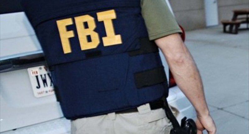 Agents in dark blue FBI windbreakers carried white cardboard boxes out of the house, which is about a mile from Atlantic City's casinos. Earlier they removed a computer and a printer, stashing the items in dark sport utility vehicles. (AFP file photo)