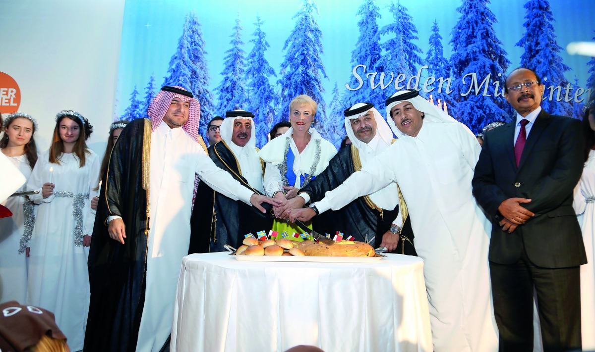 Minister of Transport and Communications H E Jassim bin Saif Al Sulaiti, Minister of Administrative Development, Labour and Social Affairs H E Yousef bin Mohamed Al Othman Fakhro, Swedish Ambassador Ewa Polano along with other dignitaries at the National 
