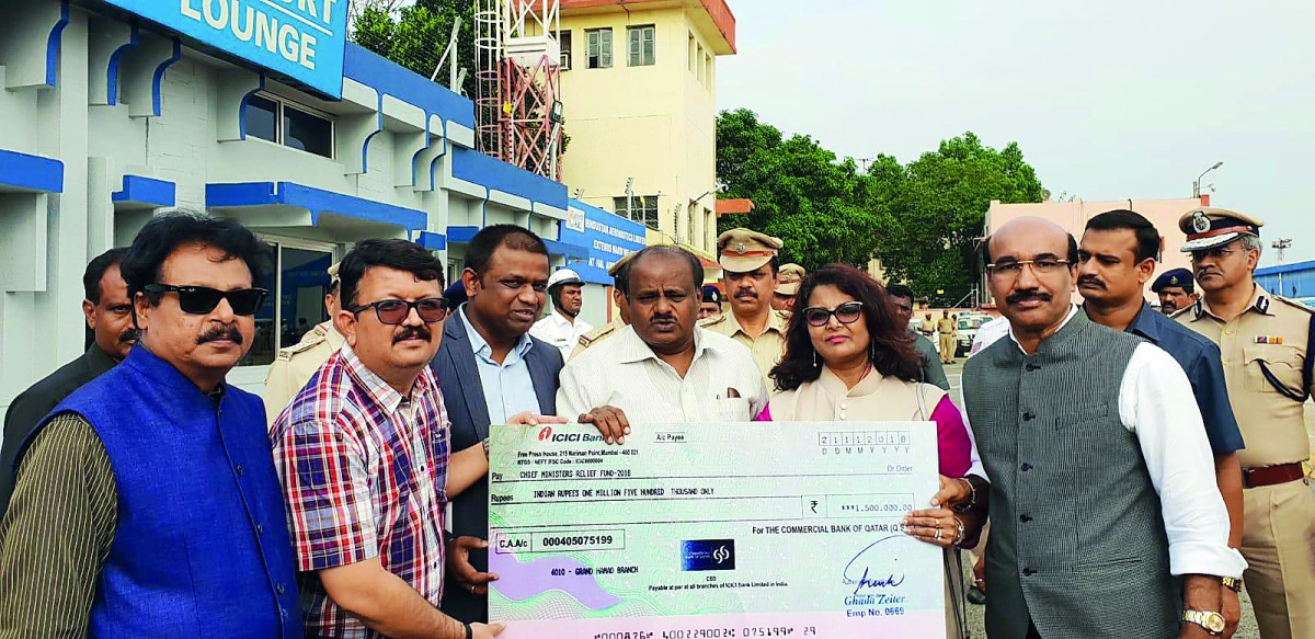 Representatives of ICBF handing over the cheque to Chief Minister of Karnataka, H D Kumaraswami.