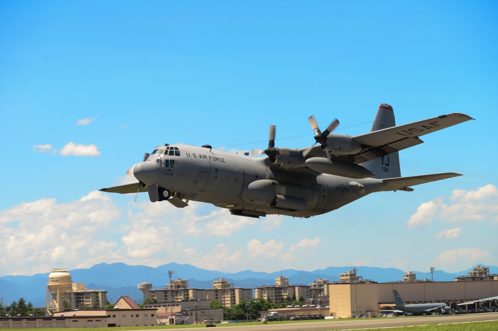 (FILES): In this July 14, 2015 photograph courtesy of the US Air Force, a C-130 Hercules takes off during a training exercise at Yokota Air Base, Japan. AFP PHOTO / US AIR FORCE / Senior Airman David Owsianka 