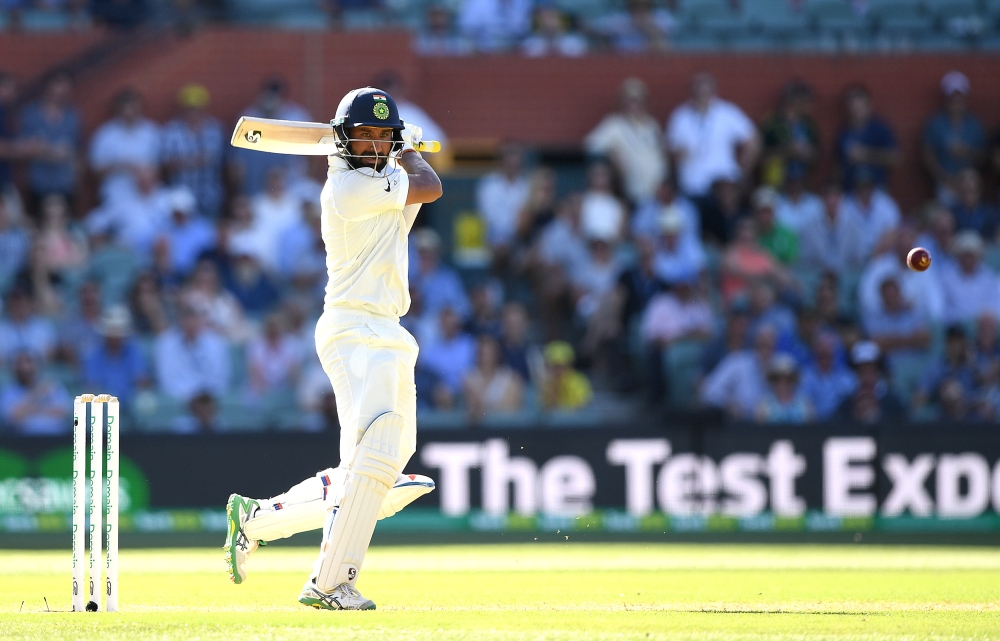 India's Cheteshwar Pujara looks on after playing a shot during day one of the first test match between Australia and India at the Adelaide Oval in Adelaide, Australia, December 6, 2018. (APP/Dave Hunt via REUTERS)