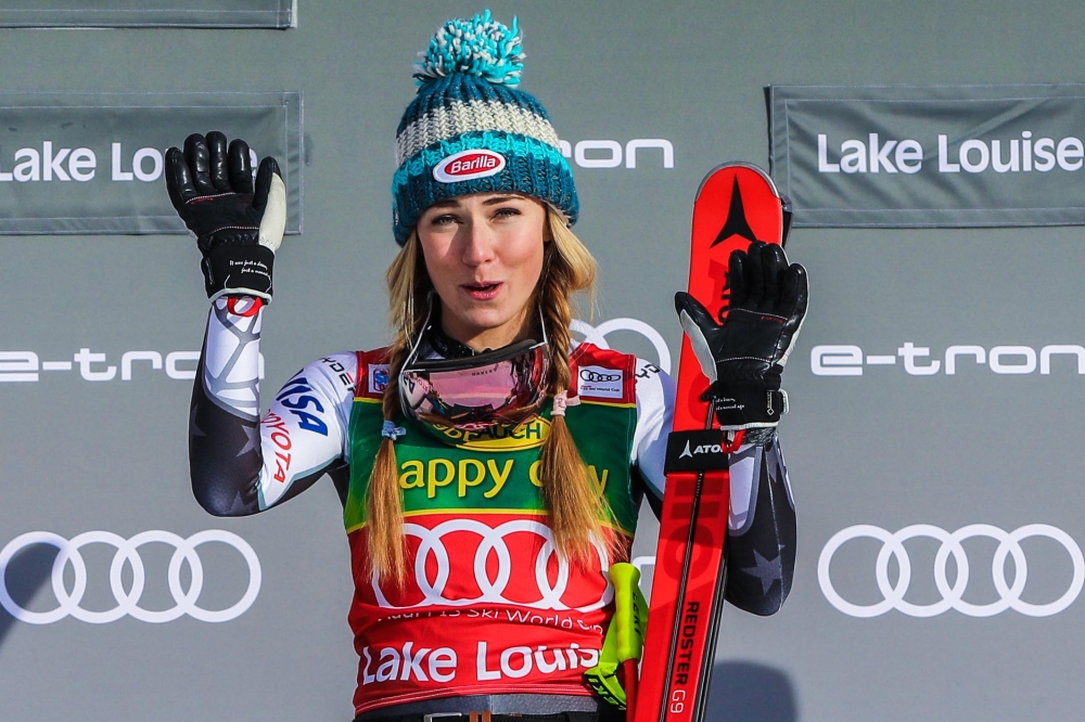 Mikaela Shiffrin of the United States celebrates as she takes the podium in the ladies Super G race in the 2018 FIS alpine skiing world cup at Lake Louise Ski Resort. Sergei Belski
