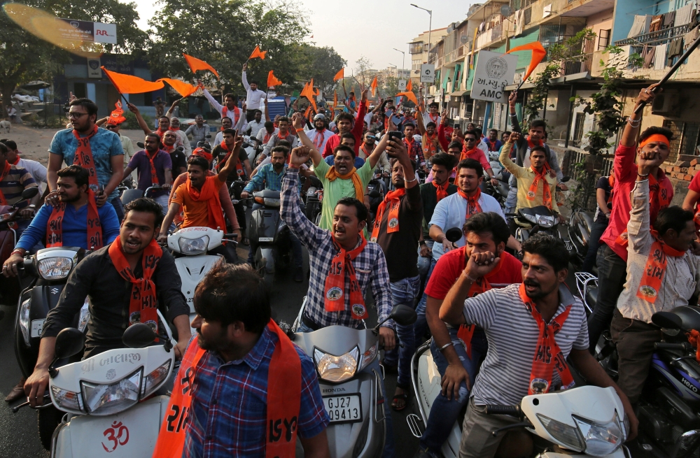 Supporters of the Vishva Hindu Parishad (VHP), a Hindu nationalist organisation, shout slogans during a rally demanding the construction of a temple on a disputed religious site in the northern Indian town of Ayodhya, in Ahmedabad, India, December 6, 2018