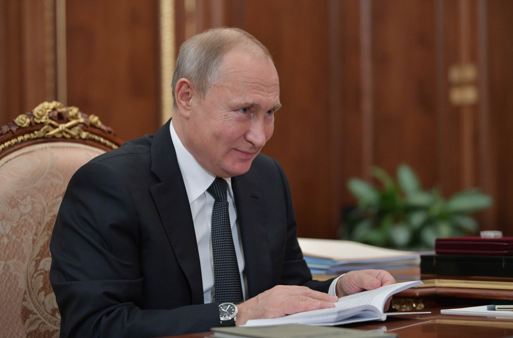 Russian President Vladimir Putin meets with the President of the Alexander Solzhenitsyn Russian Public Fund Natalia Solzhenitsyn (not pictured) in Moscow, Russia December 11, 2018. Alexei Druzhinin/Kremlin