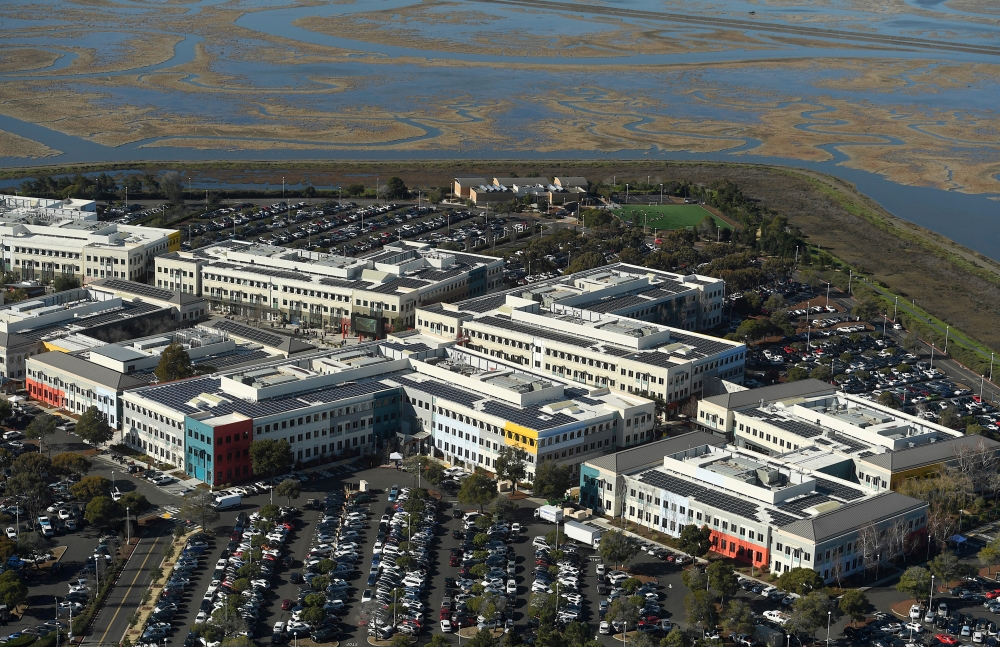 FILE PHOTO: Facebook's campus is seen on the edge of the San Francisco Bay in Menlo Park, California in this aerial photo taken January 13, 2017. REUTERS/Noah Berger/File Photo