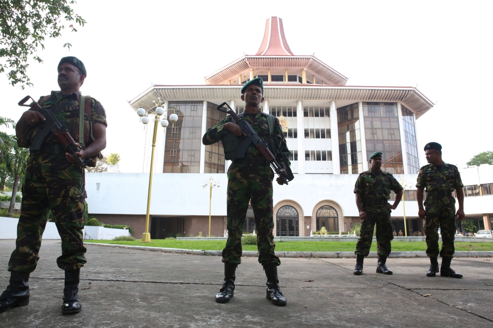 Sri Lanka's Special Task Force members stand guard in front of the supreme court premises in Colombo, Sri Lanka December 13, 2018. Reuters
