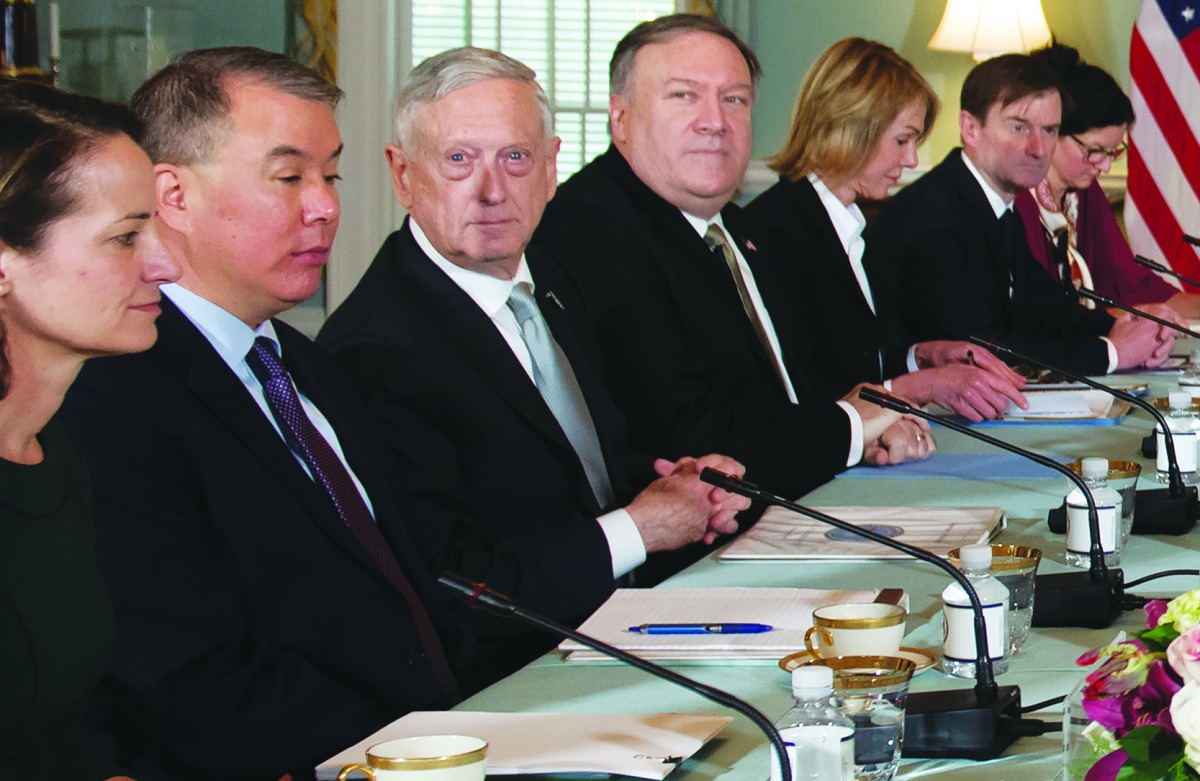 US Secretary of State Mike Pompeo (4th L) and US Secretary of Defense Jim Mattis (2nd L), hold a meeting with Canadian Foreign Minister Chrystia Freeland and Canadian Defense Minister Harjit Sajjan (both out of camera) at the State Department in Washingto