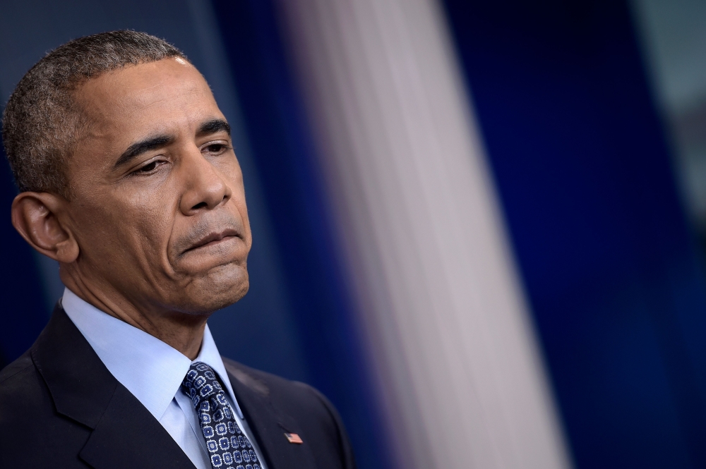 (FILES) In this file photo taken on January 18, 2017 US President Barack Obama pauses during his final press conference at the White House in Washington, DC. AFP / Brendan Smialowski
 