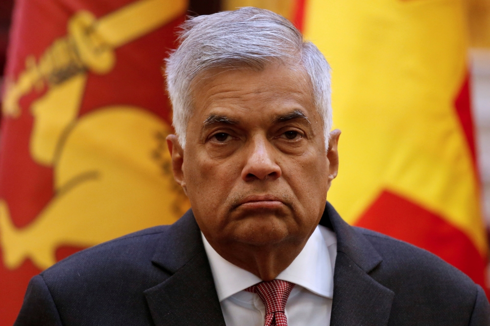 File photo of Sri Lanka Prime Minister Ranil Wickremesinghe attends a news conference with Vietnam's Prime Minister Nguyen Xuan Phuc (unseen) at the Government Office in Hanoi, Vietnam, April 17, 2017. REUTERS/Kham/File Photo