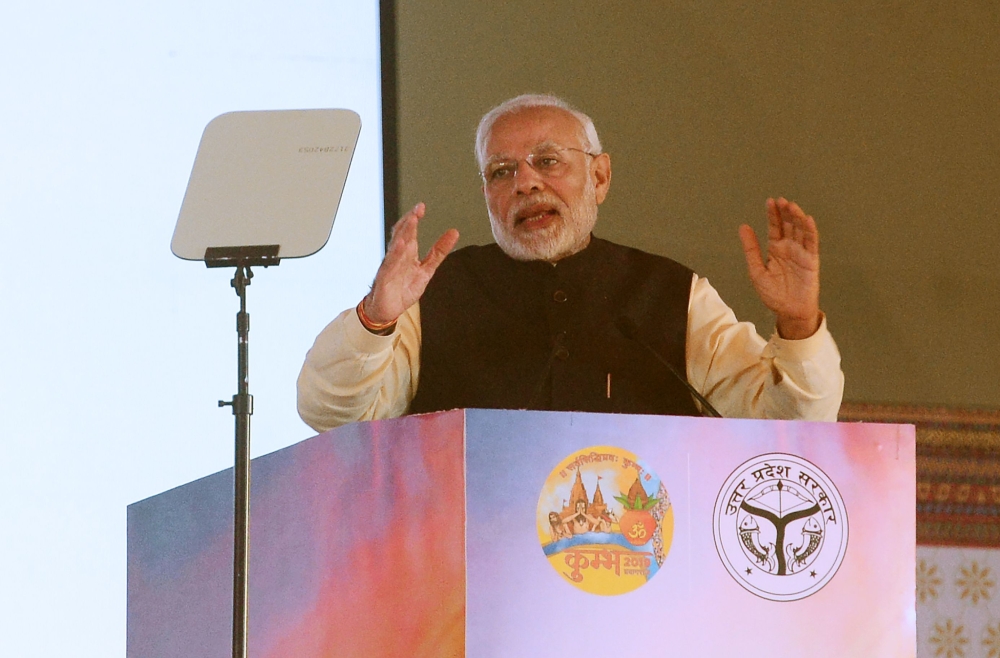 Indian Prime Minister Narendra Modi speaks during a public rally in the village of Andawa on the outskirts of Allahabad in the Indian state of Uttar Pradesh on December 16, 2018. (AFP / SANJAY KANOJIA)

