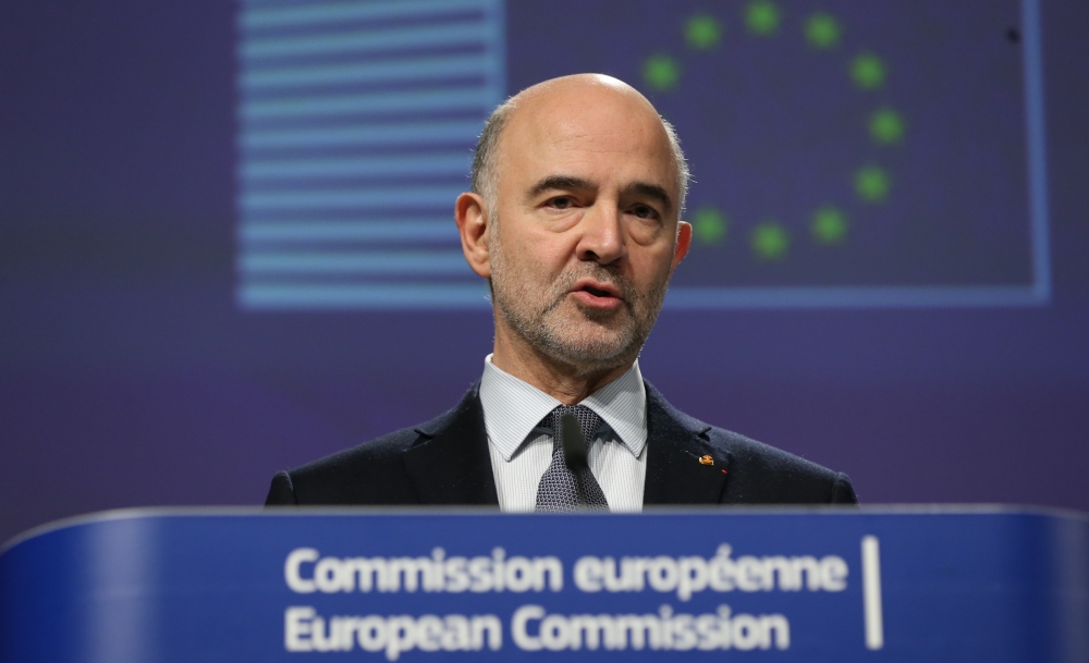European Commissioner for Economic and Financial Affairs, Pierre Moscovici and Vice President of the European Commission Valdis Dombrovskis (not seen) hold a joint press conference after attending Weekly European Commission College meeting in Brussels, Be