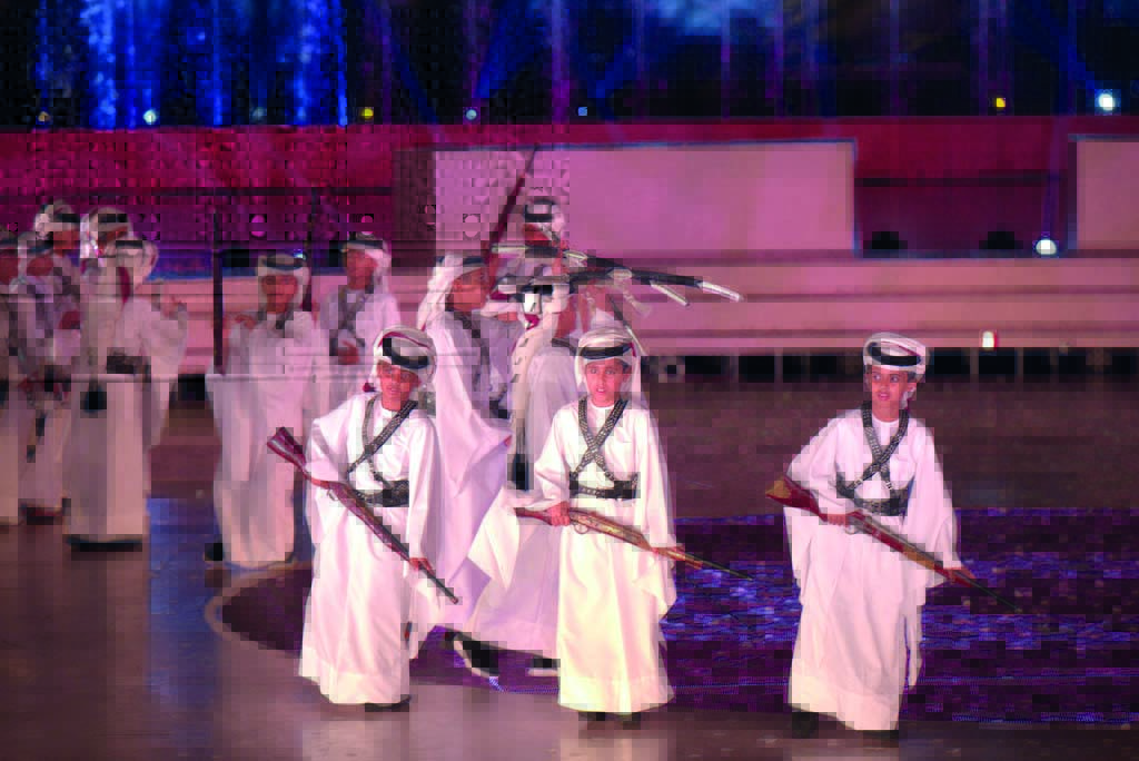 Young school students perform during Katara’s National Day festivities.