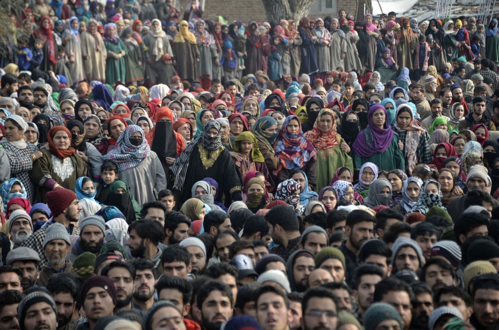 Kashmiri villagers gather near the bodies of four militants of Ansar Ghazwat-ul-Hind, a group which claims affiliation with Al-Qaeda, during a funeral procession at Dadsar village in Tral, south of Srinagar on December 22, 2018. AFP / TAUSEEF MUSTAFA