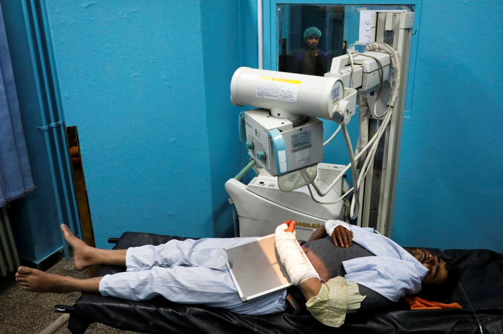 An Afghan man received treatment at a hospital after an attack in Kabul, Afghanistan December 24, 2018. REUTERS/Omar Sobhani