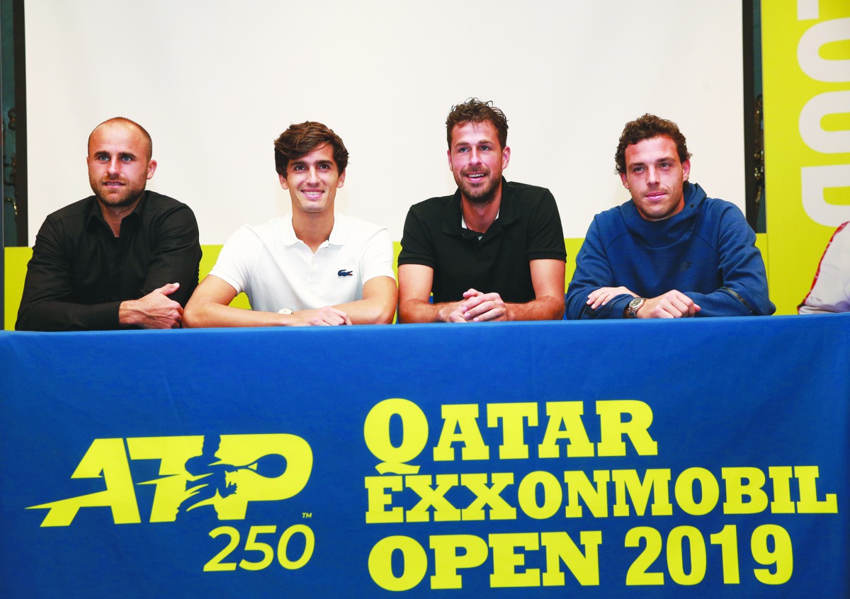 Robin Haase of the Netherlands, Pierre-Hugues Herbert of France, Marius Copil of Romania and Marco Cecchinato of Italy during the draw ceremony in Doha