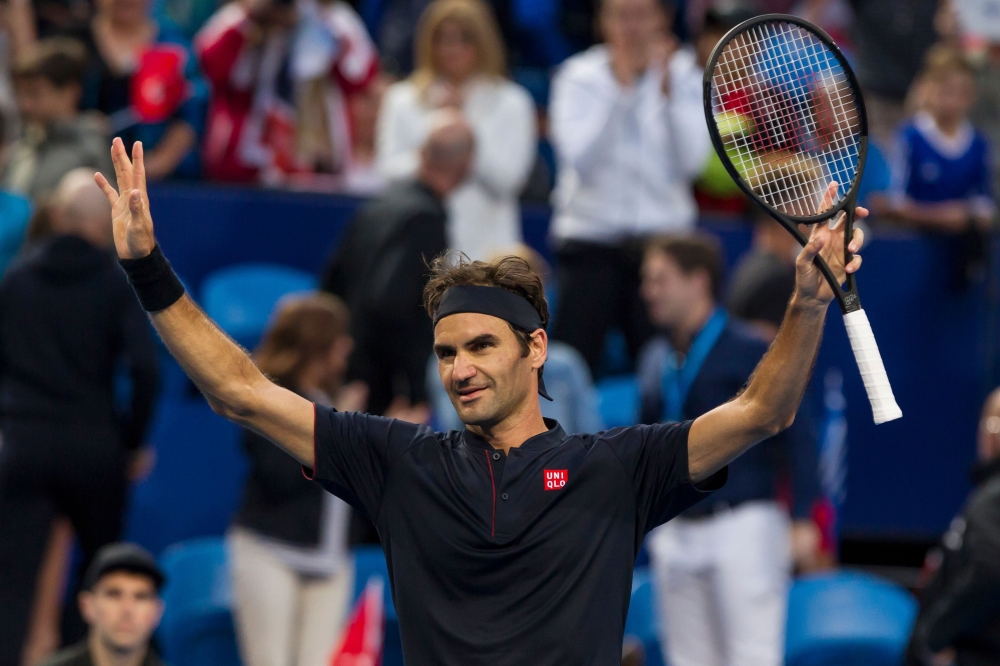Roger Federer of Switzerland celebrates his victory against Stefanos Tsitsipas of Greece during their men's singles match on day six of the Hopman Cup tennis tournament in Perth on January 3, 2019.   AFP / TONY ASHBY