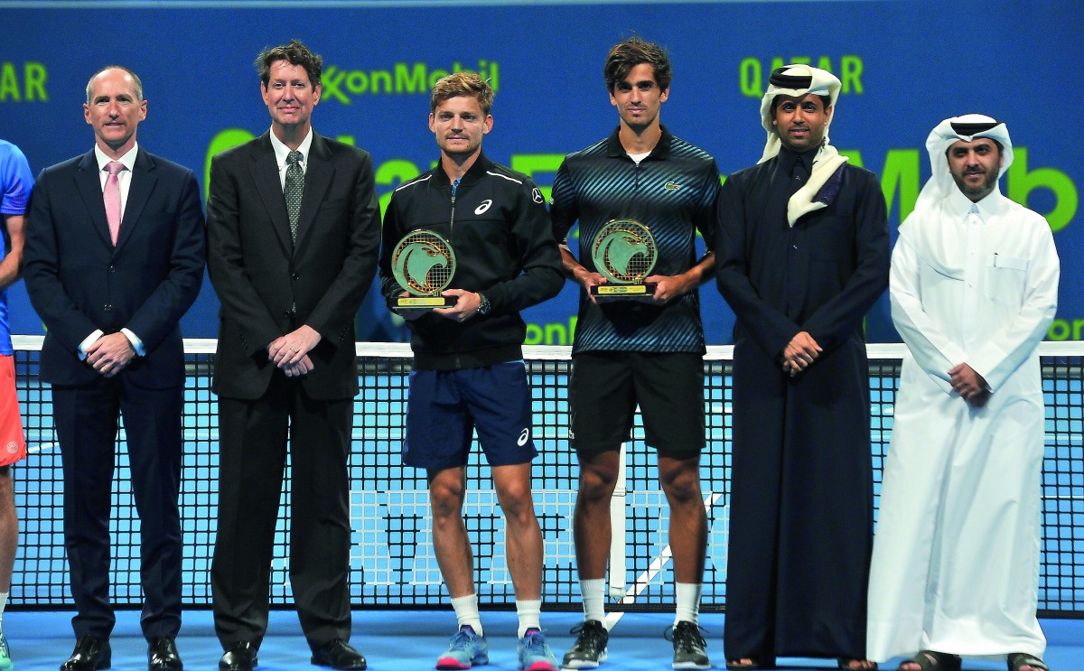 FROM LEFT: Alistair Routledge, President and General Manager, ExxonMobil Qatar, Andrew Swiger, Senior Vice President and Principal Financial Officer, ExxonMobil, Belgian player David Goffin, Frenchman Pierre-Hugues Herbert, Nasser Al Khelaifi, President, 