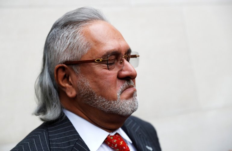 Vijay Mallya has a break outside the court house as he waits for his extradition case to be heard at Westminster Magistrates Court, in London, Britain, December 10, 2018. (REUTERS/Peter Nicholls/ File Photo)
