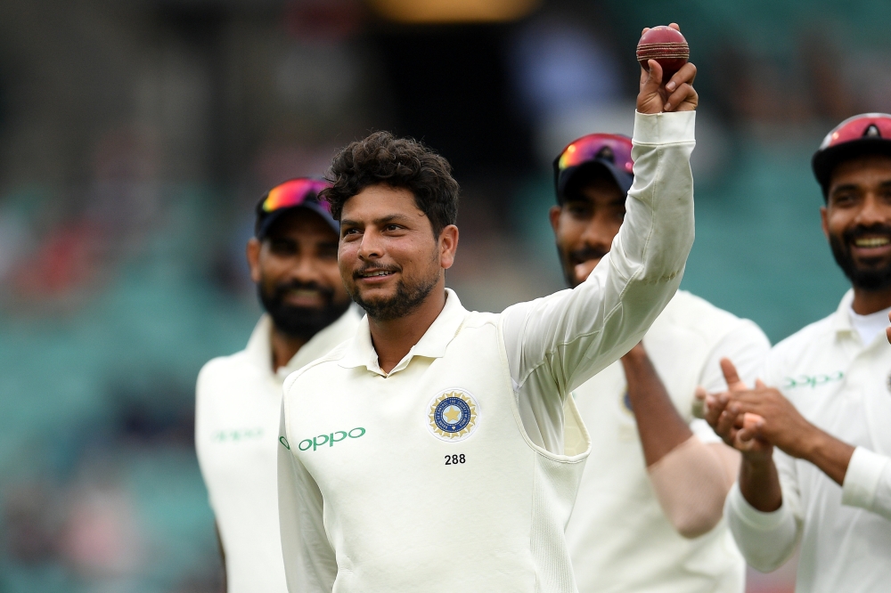 India's Kuldeep Yadav holds the ball up after taking five wickets for the innings, on day four of the fourth test match between Australia and India at the SCG in Sydney, Australia, January 6, 2019. AAP/Dan Himbrechts/via REUTERS 