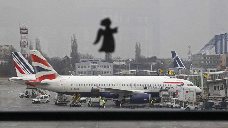 A British Airways airplane waits on the tarmac for a flight to Heathrow airport in Britain, at Otopeni international airport near Bucharest, January 1, 2014. (Reuters) 