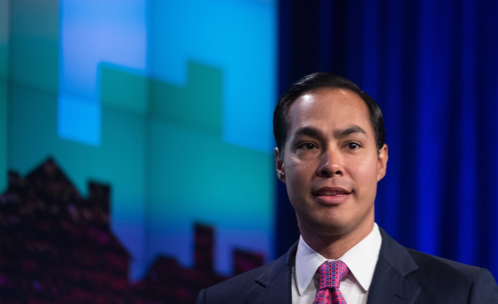 (FILES) In this file photo taken on September 02, 2015 US Housing and Urban Development (HUD) Secretary Julian Castro arrives to speak at the National Fair Housing Training and Policy Conference at the Housing and Urban Development Department in Washingto