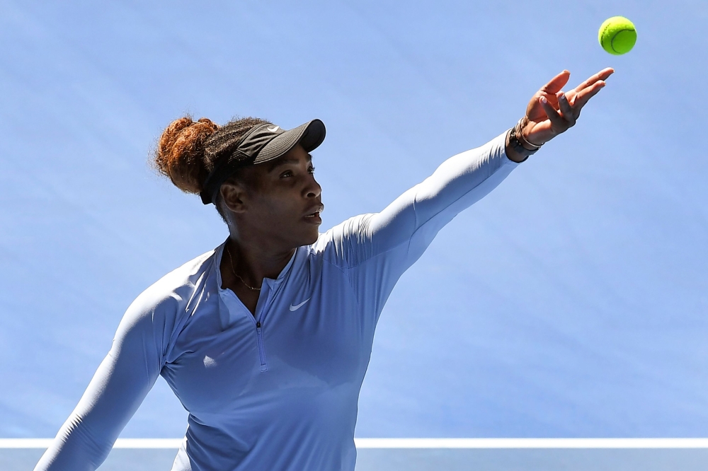 Serena Williams of the US serves during a practice session in Melbourne on January 13, 2019, ahead of the Australian Open tennis tournament.  AFP / William WEST 