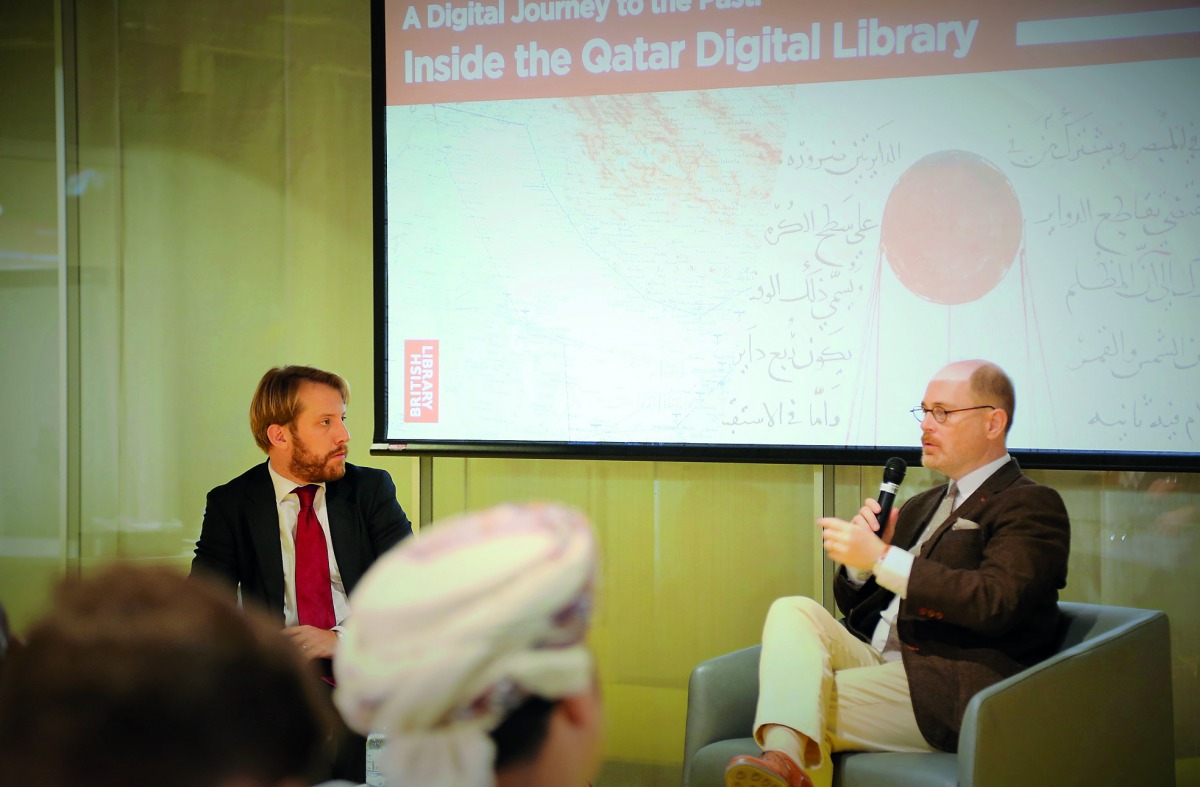 A discussion in progress on Qatar Digital Library development.