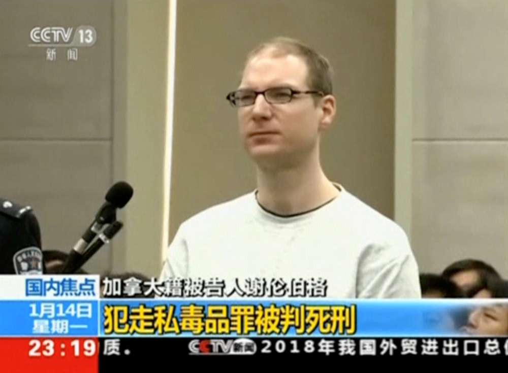 A still image taken from CCTV video shows Canadian Robert Lloyd Schellenberg in court, where he was sentenced with a death penalty for drug smuggling, in Dalian, Liaoning province, China January 14, 2019. CCTV/Reuters TV via REUTERS