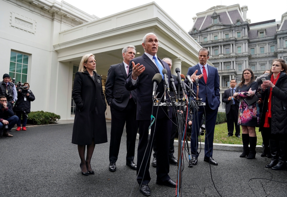 U.S. Vice President Mike Pence speaks after a meeting with President Donald Trump and Congressional Democrats about the U.S. government partial shutdown and the president's demand for a border wall in the Situation Room at the White House in Washington, U