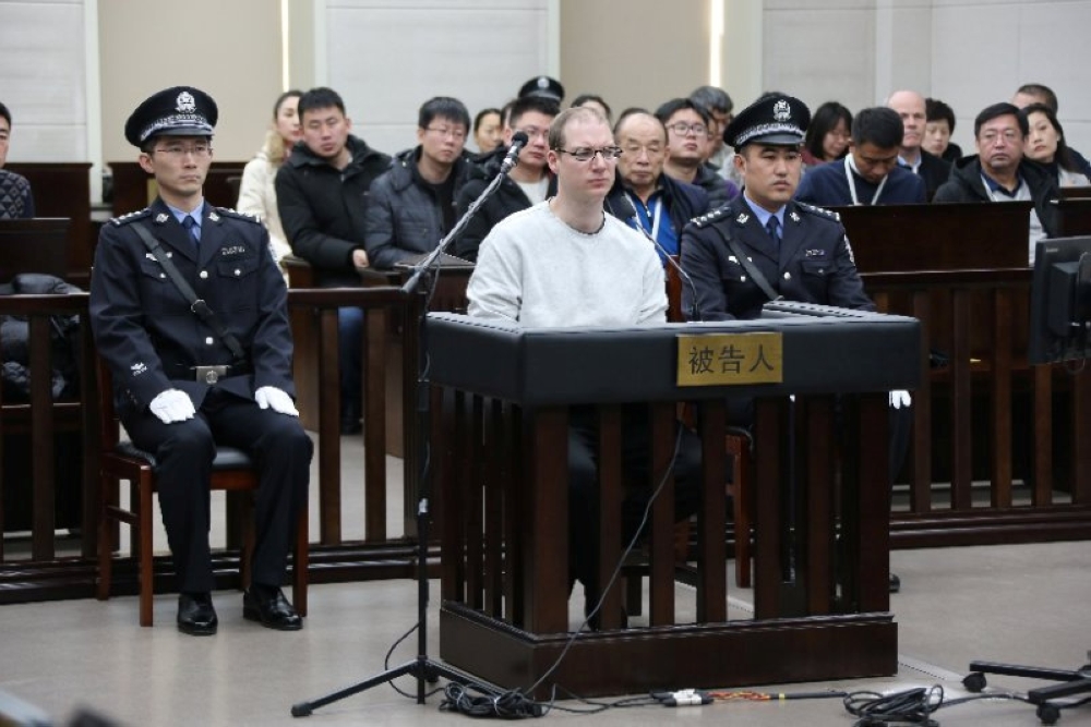 Canadian Robert Lloyd Schellenberg appears in court for a retrial of his drug smuggling case in Dalian, Liaoning province, China, January 14, 2019, in this handout picture received by Reuters January 15, 2019. Intermediate People's Court of Dalian/Handout