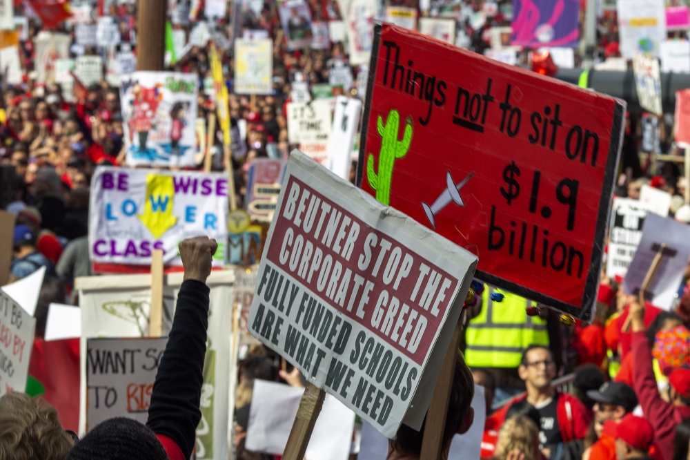 Striking teachers and supporters rally outside City as negotiations resume on January 18, 2019 in Los Angeles, California. David McNew/Getty Images/AFP