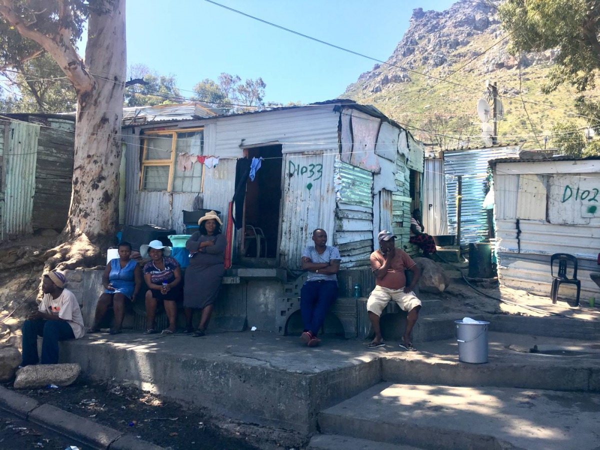 Residents of the Imizamo Yethu settlement near Cape Town, South Africa on October 25, 2018. Thomson Reuters Foundation/Inna Lazareva