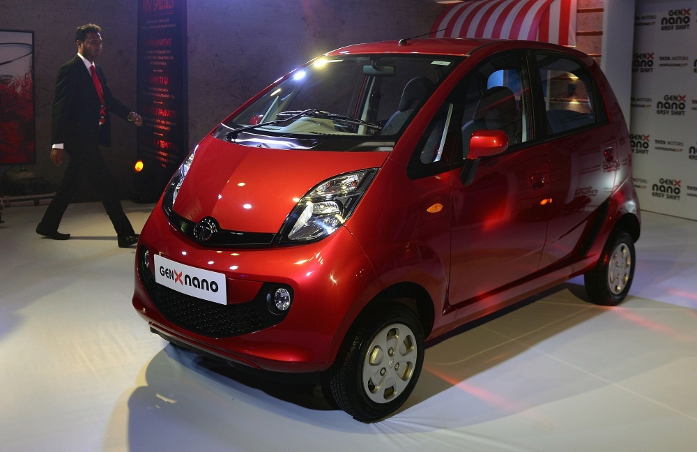  In this file photo taken on May 19, 2015 Tata Nano's new GenX car is seen on display during its launch in Mumbai.  / AFP / Punit PARANJPE 