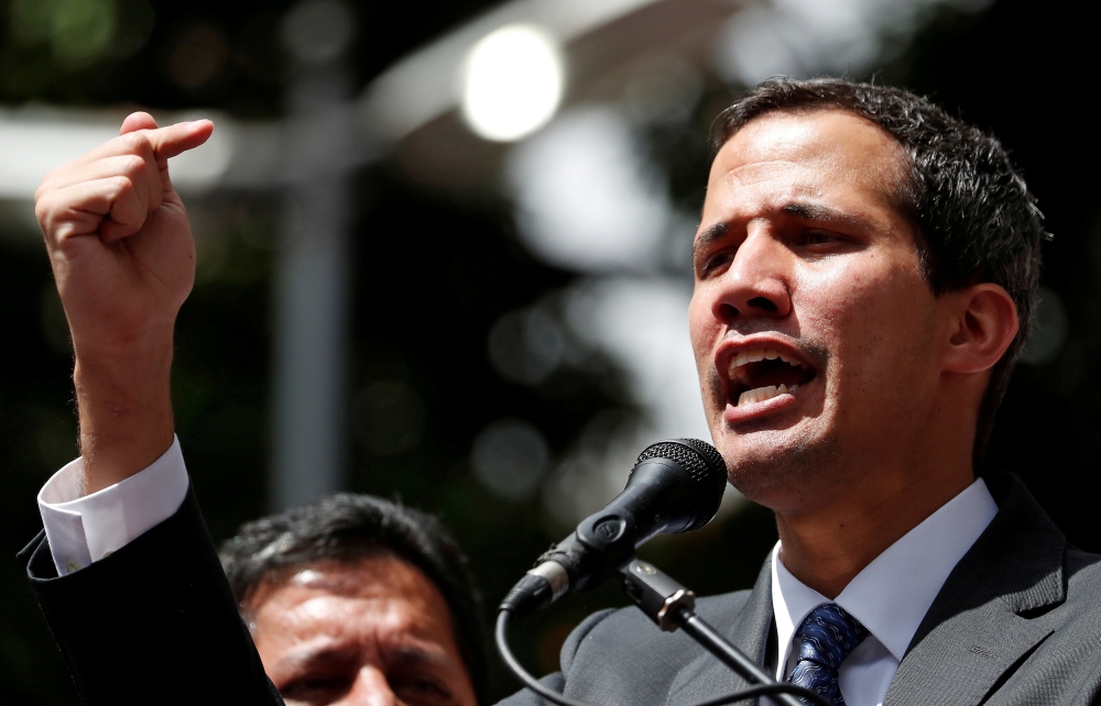FILE PHOTO: Venezuela's opposition leader Juan Guaido speaks during a news conference in Caracas, Venezuela, January 25, 2019. REUTERS/Carlos Garcia Rawlins