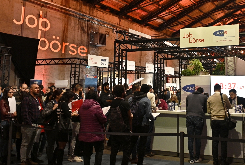 People visit a job fair for young people who have been granted asylum on January 23, 2019 in Vienna. Austria. AFP / APA / Hans Punz
 