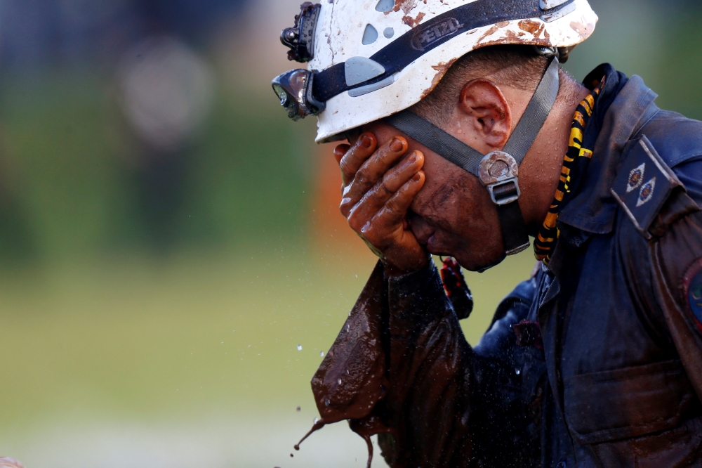 A member of rescue team reacts, upon returning from the mission, after a tailings dam owned by Brazilian mining company Vale SA collapsed, in Brumadinho, Brazil January 27, 2019. Reuters/Adriano Machado