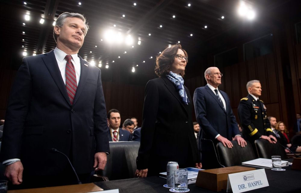 FBI director Christopher Wray, CIA director Gina Haspel National Intelligence  director Daniel Coats, Defense Intelligence Agency director General Robert Ashley arrive to testify on Worldwide Threats during a Senate Select Committee on Intelligence hearin