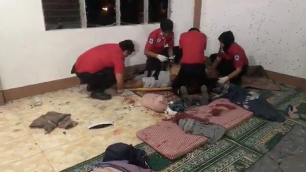  Rescue personnel work to resuscitate a victim after a grenade attack on a mosque in Zamboanga, Philippines, January 30, 2019, in this still image taken from a video from social media. Zamboanga Quick Response System/via Reuters 