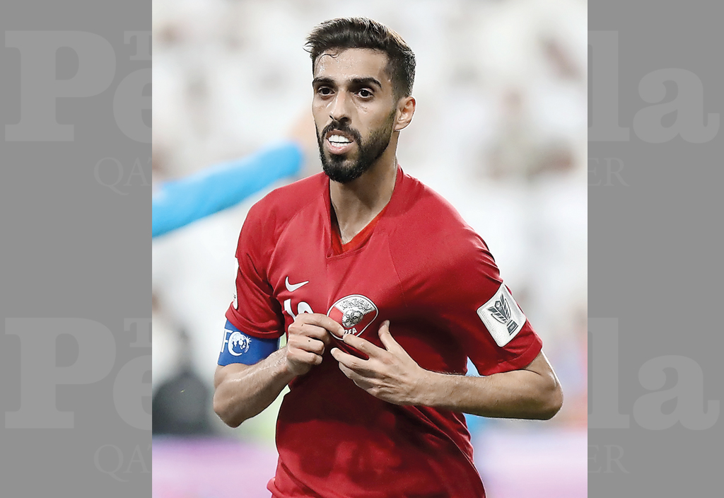 Qatari captain Hassan Al Haydos celebrates after scoring their third goal against the UAE during their AFC Asian Cup semi-final, on Tuesday. 