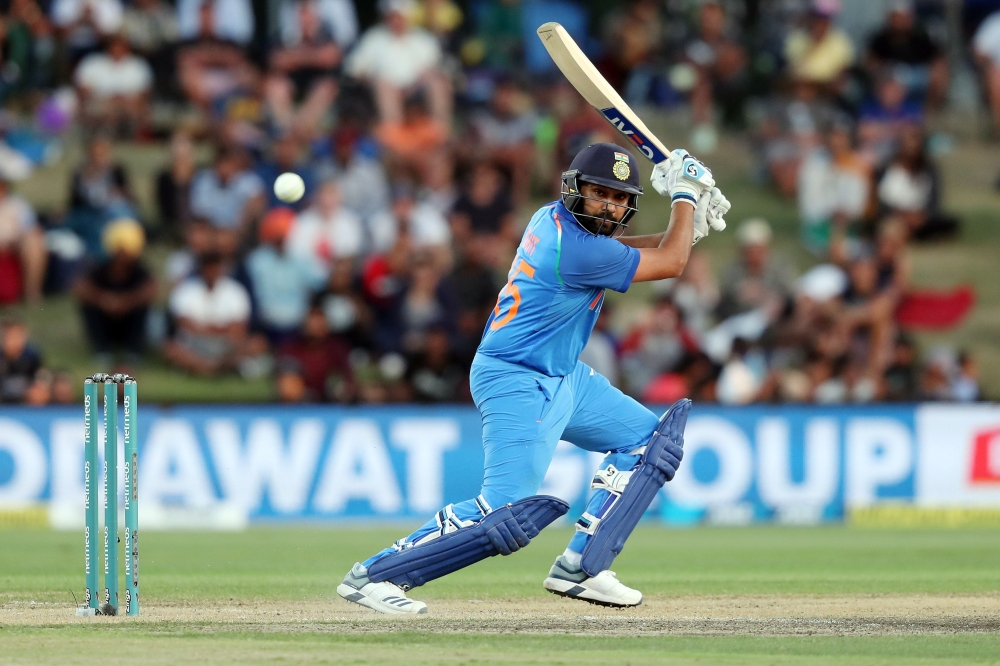 India's Rohit Sharma bats during the third one-day international cricket match between New Zealand and India at Bay Oval in Mount Maunganui on January 28, 2019. / AFP / MICHAEL BRADLEY