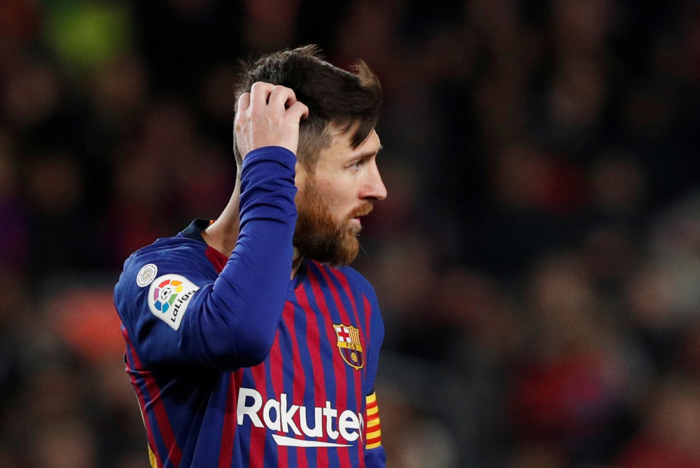 Barcelona's Lionel Messi looks dejected during the match REUTERS/Albert Gea
