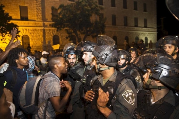 FILE PHOTO: Israeli protesters, Jews of Ethiopian origin, participate in a protest on what they say was police violence against their community in Jerusalem April 30, 2015. Reuters/Ronen Zvulun