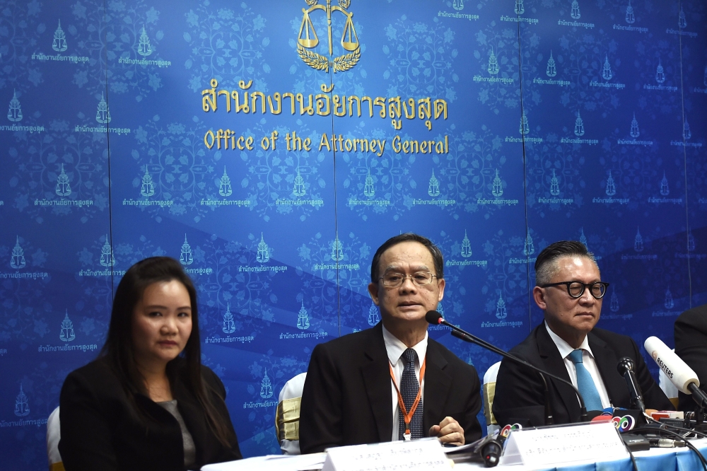 Chatchom Akapin, (C), director general for international affairs of the Office of the Attorney General, speaks during a press conference regarding the case of Bahraini refugee footballer Hakeem al-Araibi in Bangkok on February 6, 2019. Thailand will not g